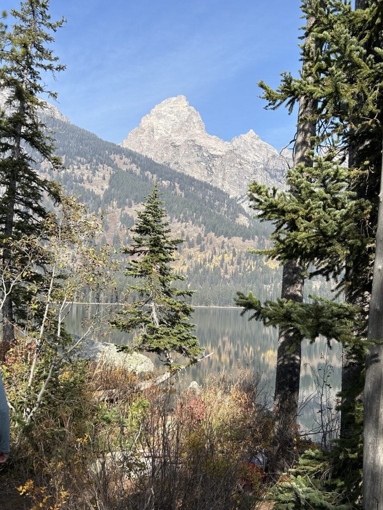 A scenic view of the three big mountains in the Teton Range.
